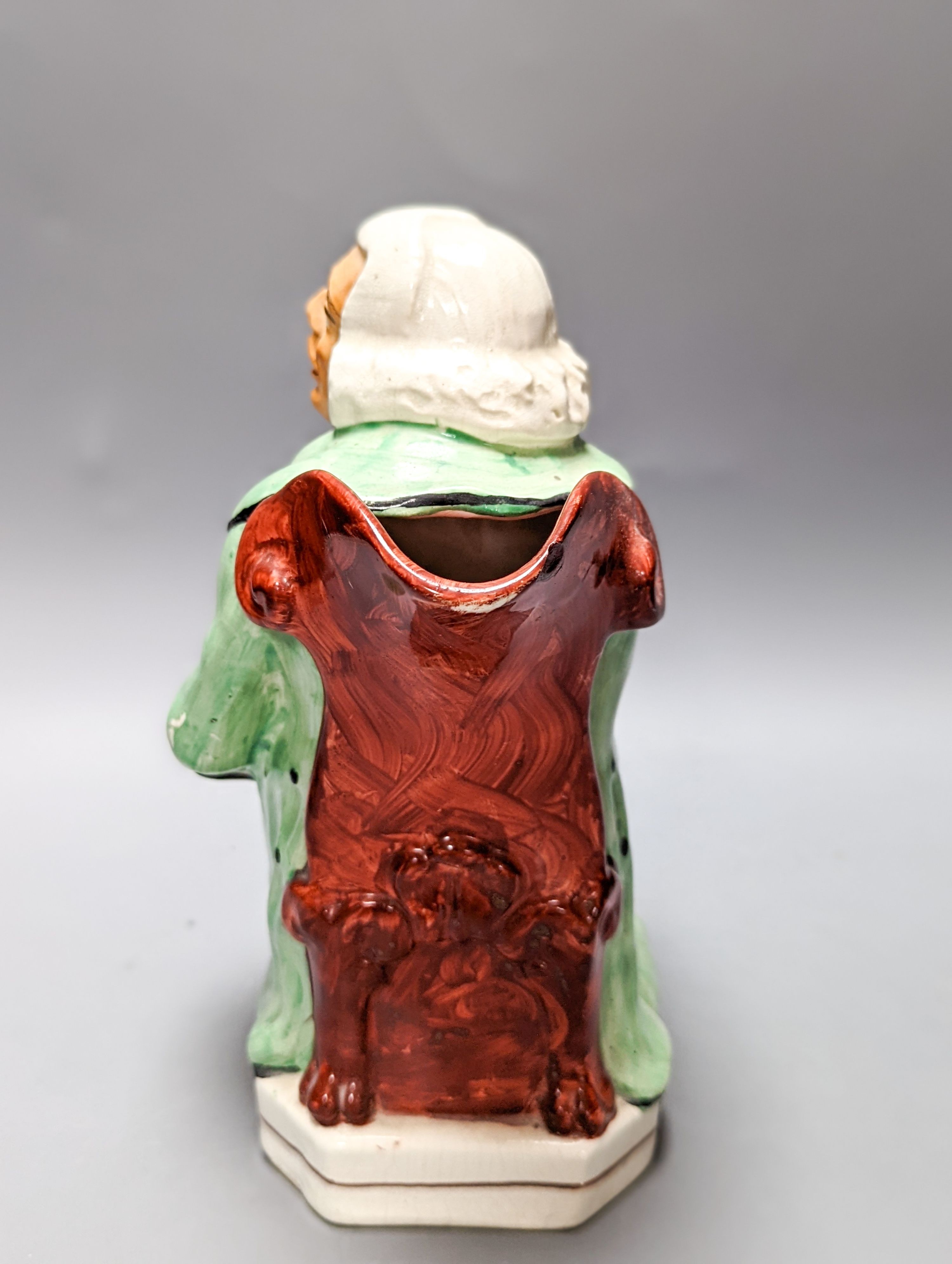 A Victorian earthenware character jug, The old lamp lighter 23cm